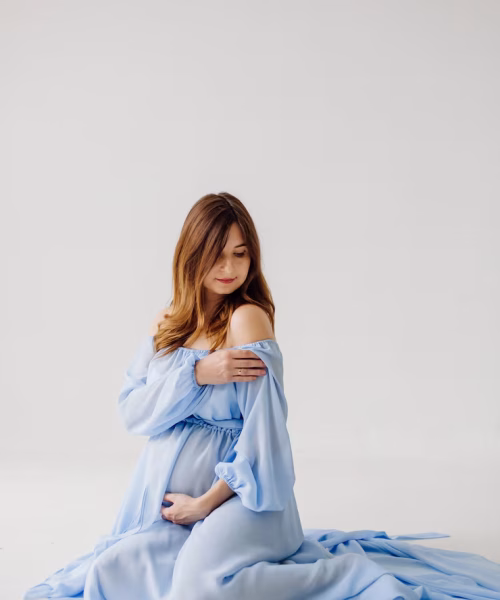 elegant-pregnant-mom-dress-posing-proud-her-pregnancy_1328-4143